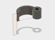 After extruding the first sketch, I created a drawing for the stand at the end of the arm.